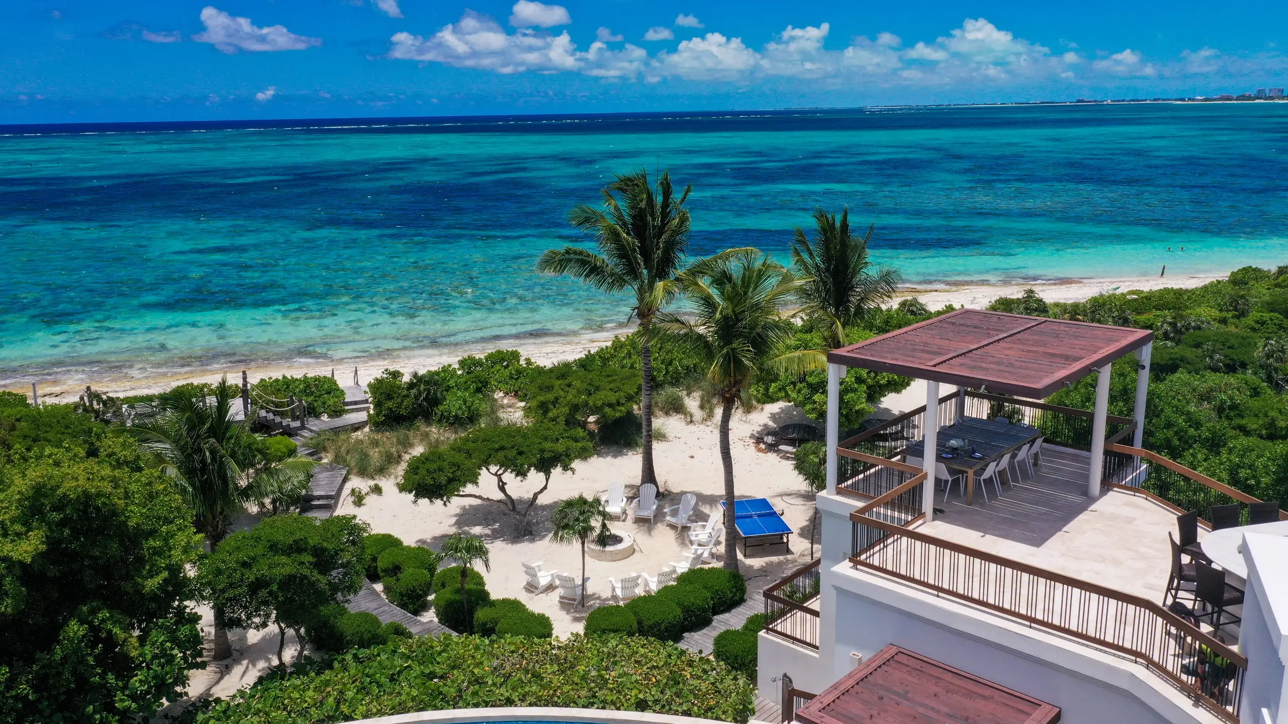 The roof terrace above the beach and the turquoise water