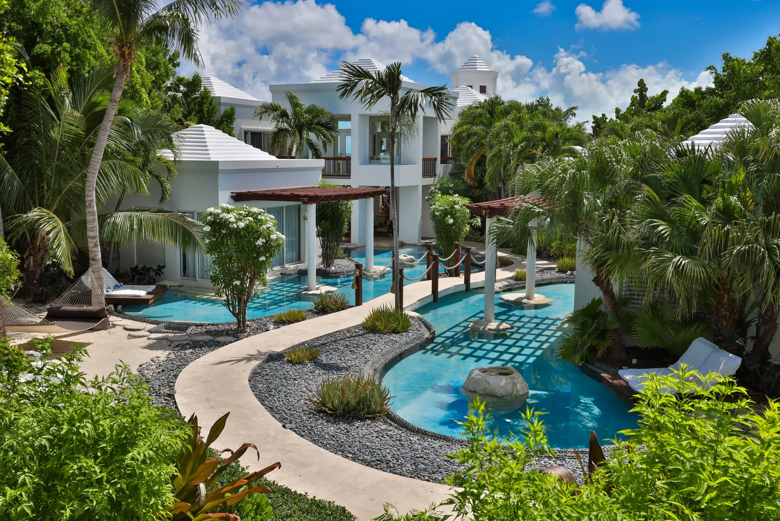 Stepping stones across the lagoon pool