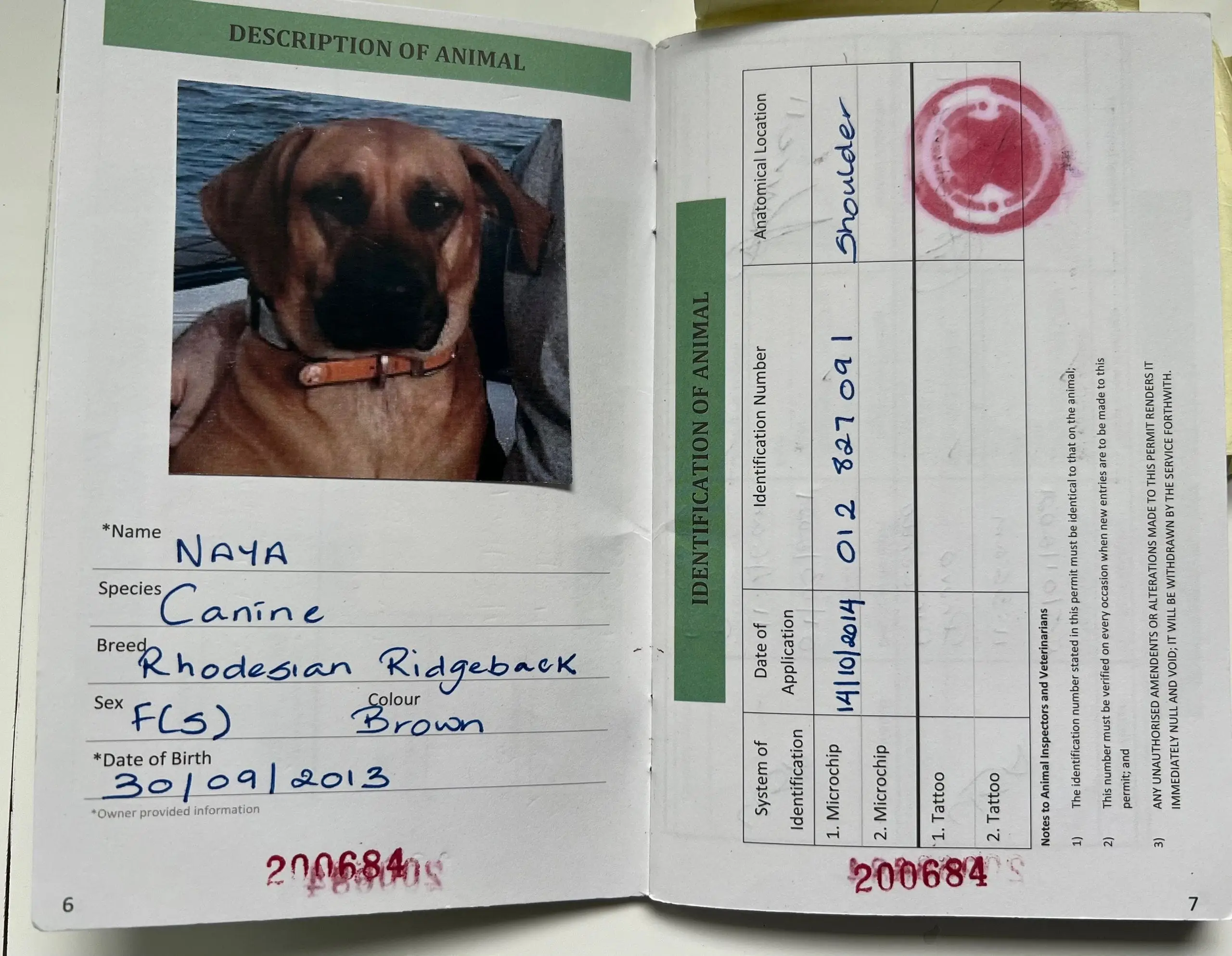 The identity page of Naya’s TCI passport
