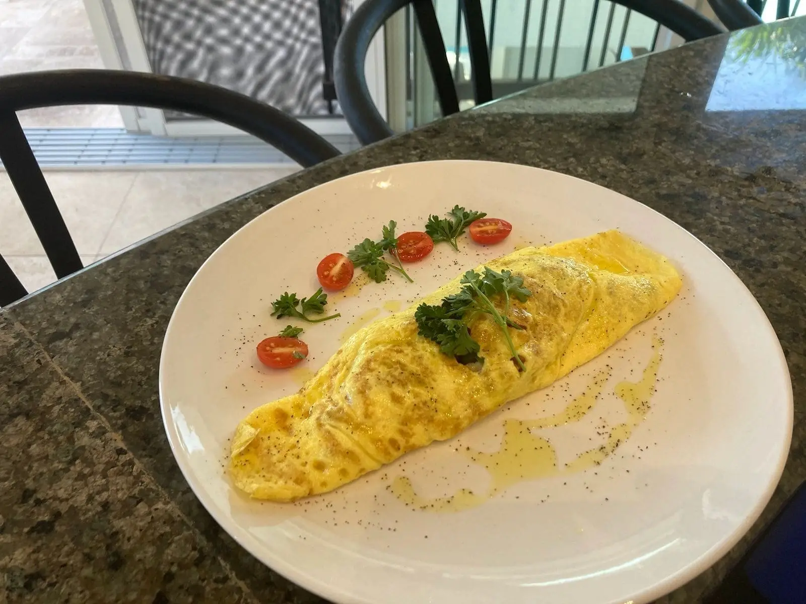 A breakfast omelette by the pool