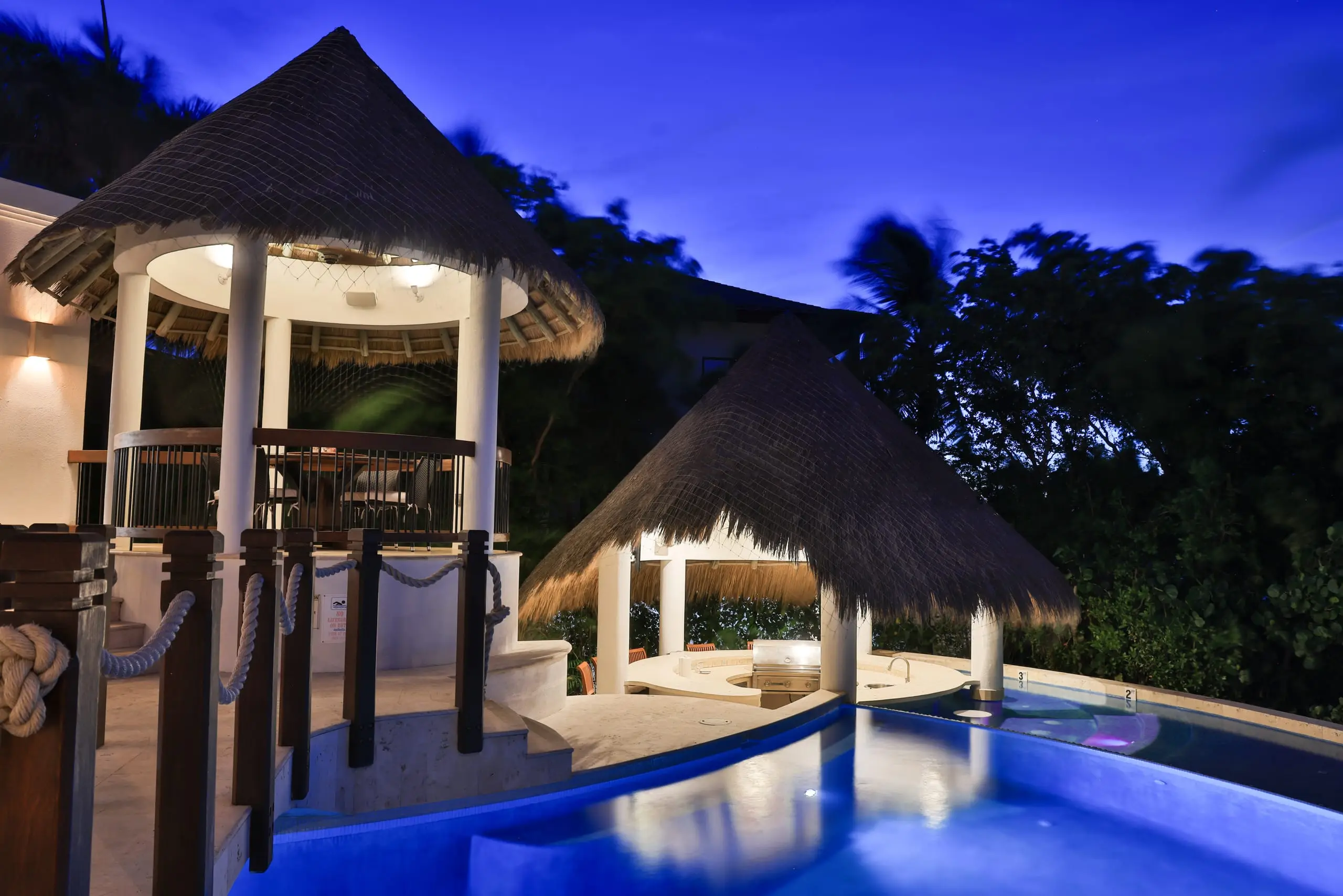 The main pool and gazebo at twilight