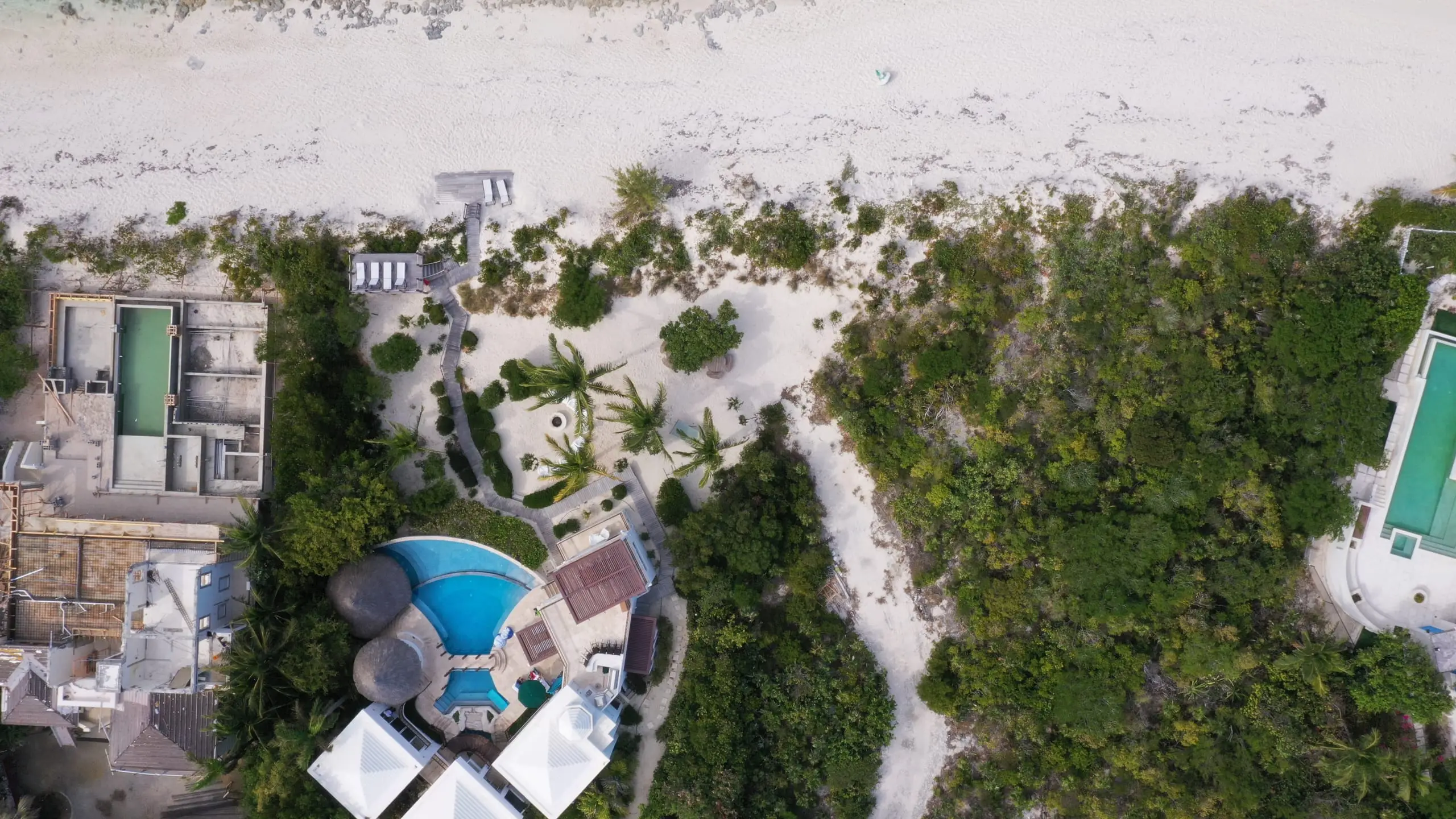 The beach, the dune and the villa from directly above